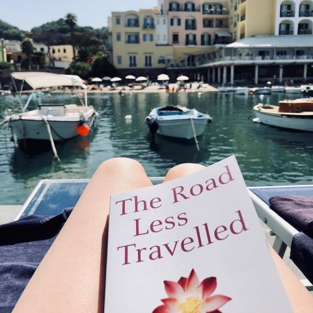 The book "The Road Less Traveled" seen on the account Instagram of Lily Collins