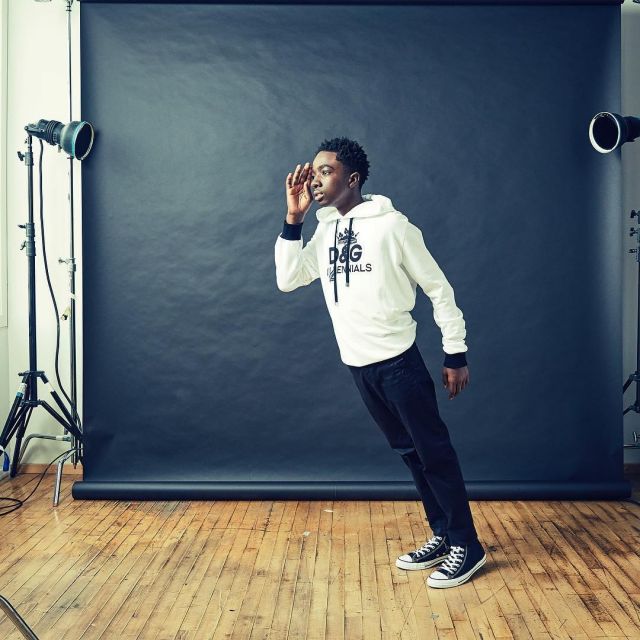 The Sneakers Converse All Star Hi black worn by Caleb Mclaughlin on his account Instagram