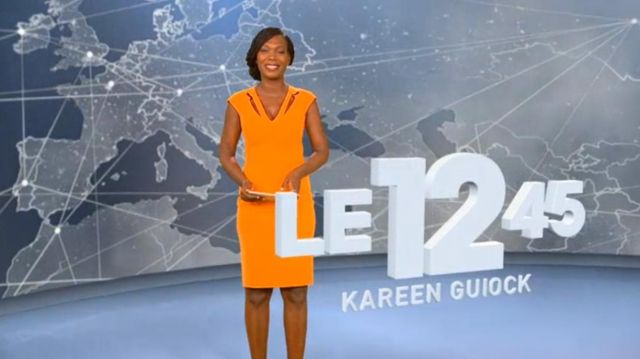 The orange gown with cut-outs of Kareen Guiock in The 12:45