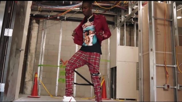 The red pants printed tartan YNW Melly in the video clip "Virtual (Blue Balenciagas)" (Shot By @DrewFilmedit)