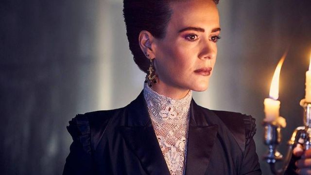 Ms. Wilhemina Venable's (Sarah Paulson) lace turtleneck top as seen in Ame­ri­can Hor­ror Story Apo­ca­lypse (S08)