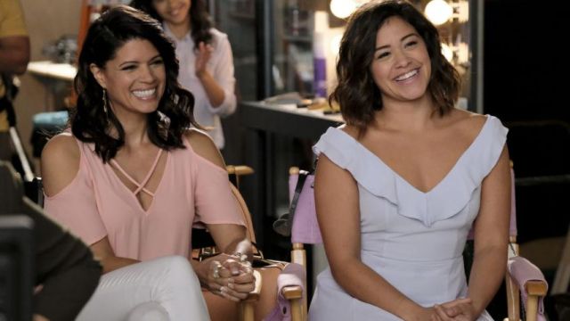 The dress sky blue with ruffles worn by Jane Villanueva (Gina Rodriguez) in Jane The Virgin S03E15