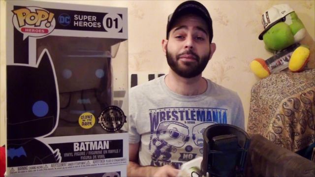 The funko pop Batman Glow in the dark wrestling club in the video My Collection: 50 Funko Pop! (WWE, DBZ, GoT, Marvel, Friends, etc...)