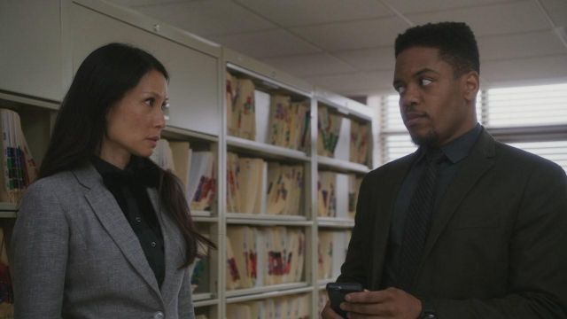 Black bow-tie worn by Dr. Joan Watson (Lucy Liu) as seen in Elementary S06E05