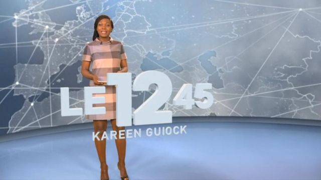 The plaid dress of Kareen Guiock in The 12:45 to M6 of the 05/11/2018