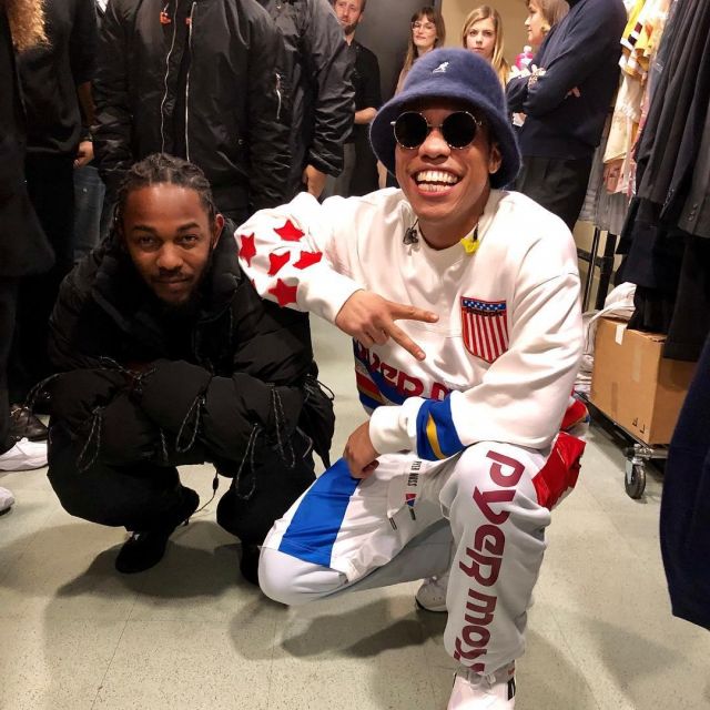 Pyer Moss Sweaters American flag worn by Anderson .Paak on the Instagram account @anderson._paak