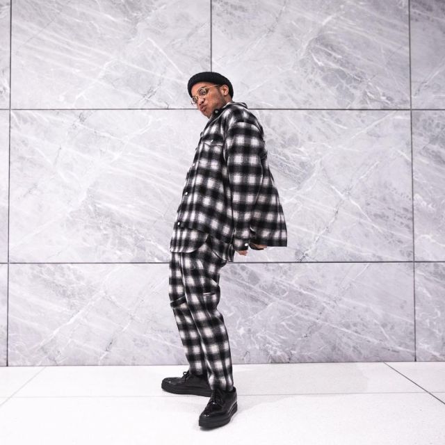 Black and white plaid shirt worn by Anderson .Paak on the Instagram account @anderson._paak