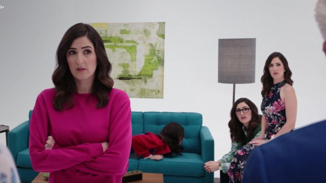 The sweater pink Cotton Citizen worn by Janet (D'arcy Carden) in The Good Place S03E09