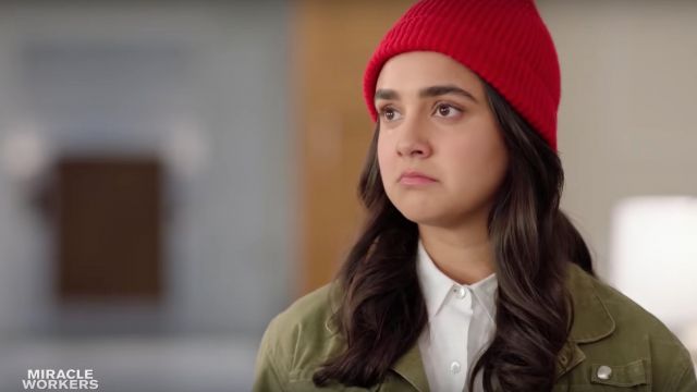 The red cap worn by Eliza (Geraldine Viswanathan) in Miracle Workers Season 1