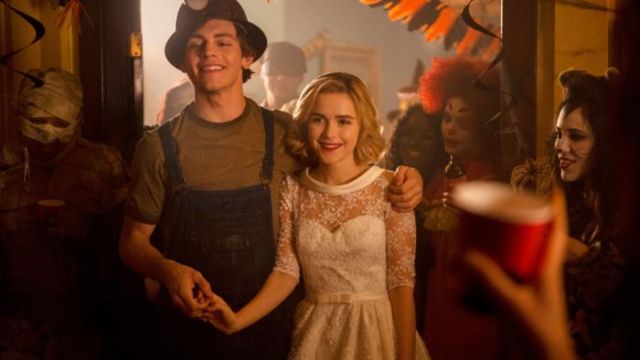 The wedding dress worn for his baptism obscure by Sabrina Spellman (Kiernan Shipka) in The New Adventures of Sabrina S01E02