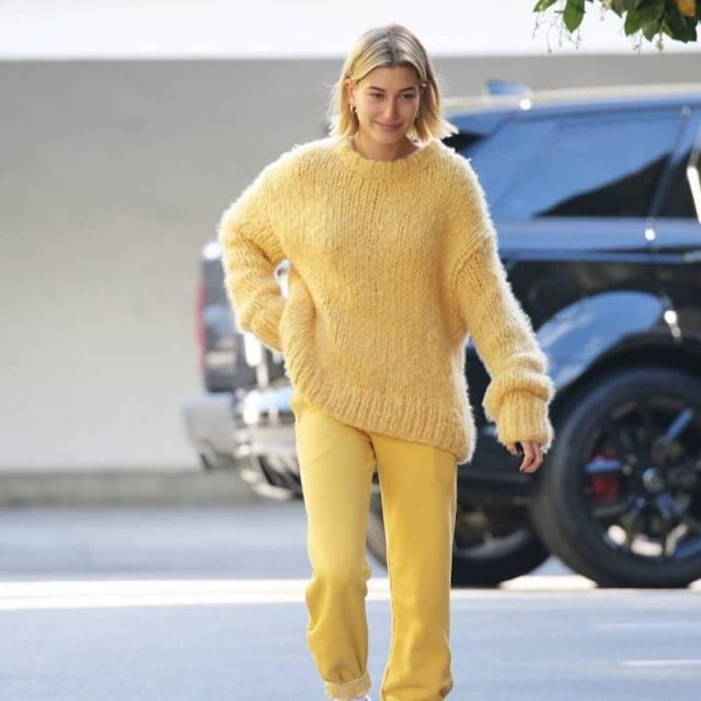 Cotton Citizen Aspen Sweatpants in yellow worn by Hailey Rhode Bieber in Los Angeles - 20 December 2018