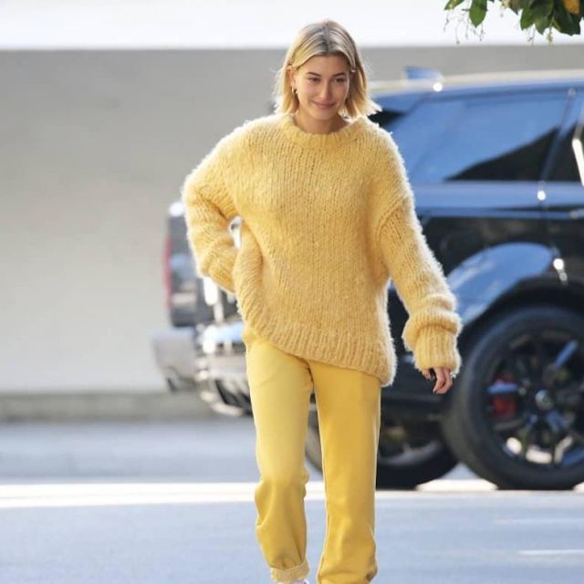 Cotton Citizen Aspen Sweatpants in yellow worn by Hailey Rhode Bieber in Los Angeles - 20 December 2018