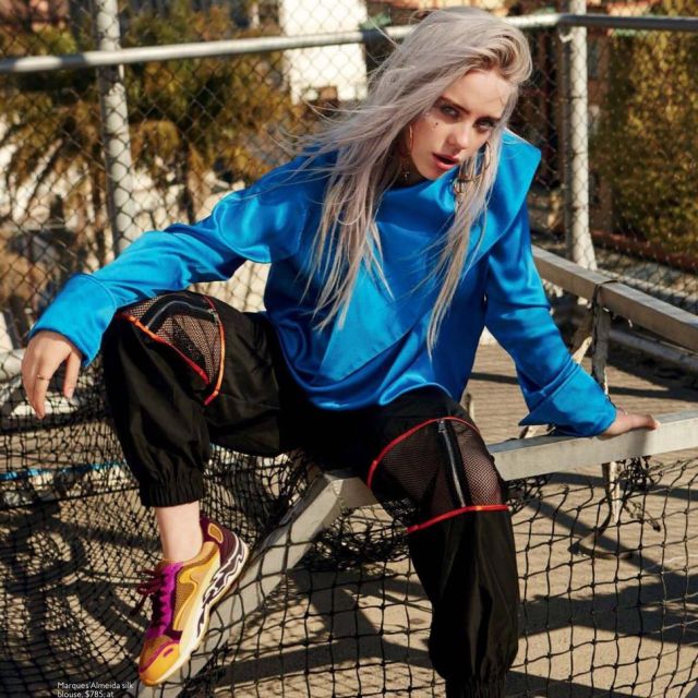 Sneakers with flames on the sole worn by Billie Eilish on the Instagram account @instylemag
