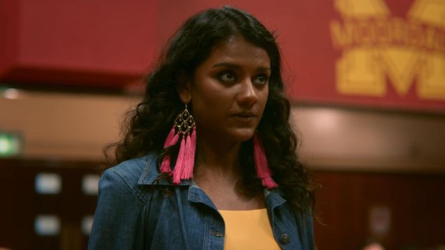 Oli­via's (Si­mone Ash­ley) pink tassel earrings as seen in Sex Edu­ca­tion S01E05