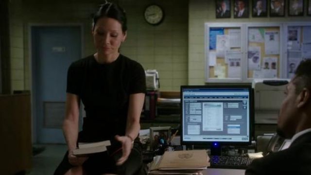 DKNY   Wrap Effect Faille Dress worn by Dr. Joan Watson (Lucy Liu) in Elementary (S05E12)