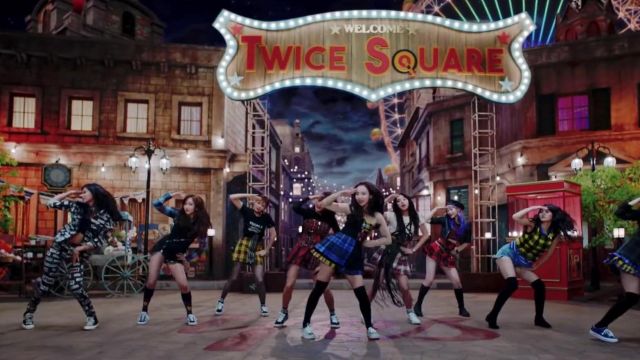 The jacket Moschino black and white Tzuyu in the clip Yes or Yes Twice