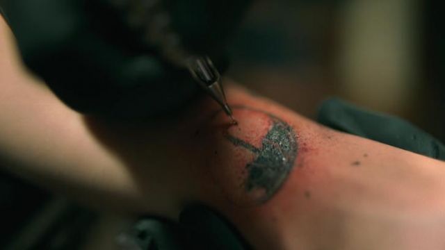 Umbrella tatoo as seen in The Umbrella Academy S01E01
