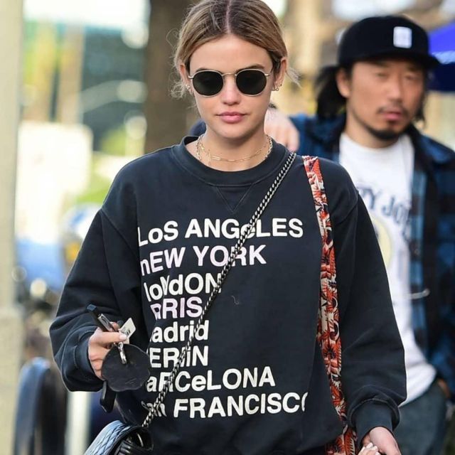 Los Angeles New York London Paris Sweatshirt worn by Lucy Hale Takes Her Dog For a Walk in Studio City