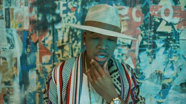 Colorful coat worn by Ne-Yo in his Push Back music video with Bebe Rexha and Stef­flon Don