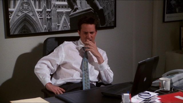 Apple Black Laptop used by Chandler Bing (Matthew Perry) in Friends (S07E24)