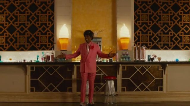 The pants pink worn by The Salesman (Samuel L. Jackson) in Unicorn Store