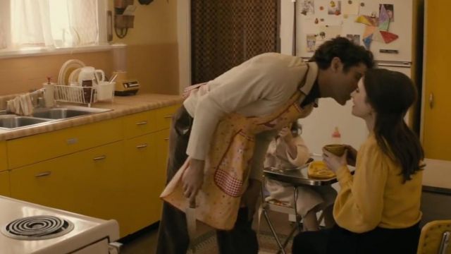 The blouse is yellow with puffed sleeves, Liz Kendall (Lily Collins) in Extremely Wicked, Shockingly Evil and Vile
