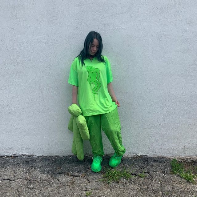 The Green T Shirt Worn By Billie Eilish On His Account Instagram