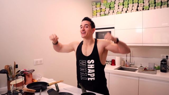 The tank top TeamShape of Tibo InShape in his YouTube video I EAT LIKE THE ROCK FOR 24 hours !!
