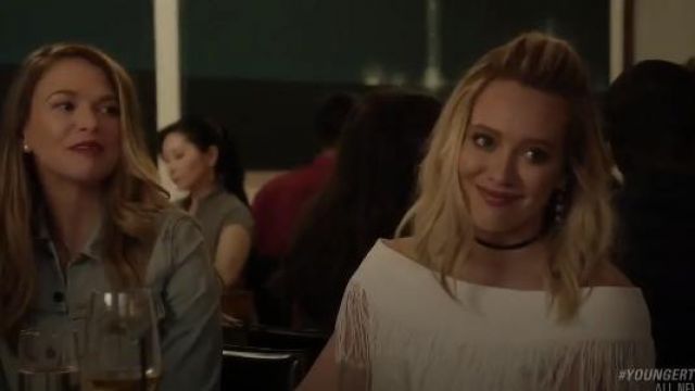 Jonathan Simkhai Fringed off-the-shoulder woven top worn by Kelsey Peters (Hilary Duff) in Younger (S03E02)