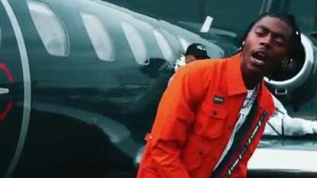 The Adidas jacket orange door by Koba laD in his clip, RR 9.1 feat. Niska