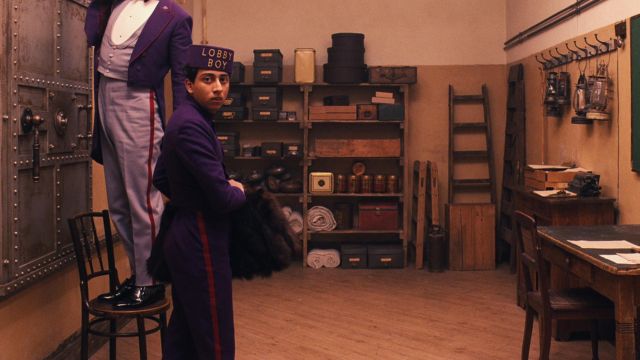 The pants violet as Zero Moustafa in The Grand Budapest Hotel