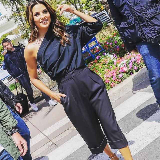 The combination of asymmetric black worn by Eva Longoria on the croisette on may 16, 2019 at the Cannes film Festival