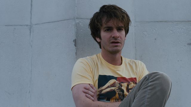 Emanuele Taglietti Art in Yellow t-shirt worn by Sam (Andrew Garfield) as seen in Under the Silver Lake