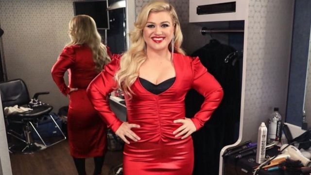 Jonathan Simkhai red ruched front dress worn by Kelly Clarkson on The Voice May 2019