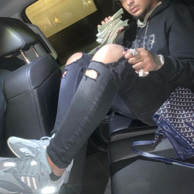 The pair of the adidas Yeezy Boost 700 Inertia carried by Smokepurpp on his account Instagram @smokepurpp