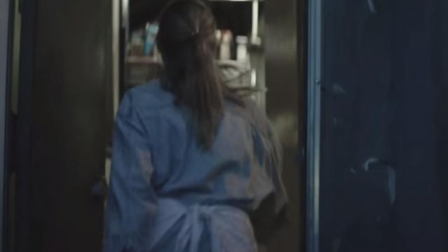 Oversized jean shirt worn by a waitress as seen in Falling like the Stars music video by James Arthur