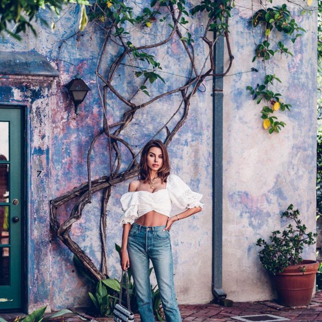 Short white lace top worn by Annabelle Fleur on the Instagram account of @vivaluxuryblog