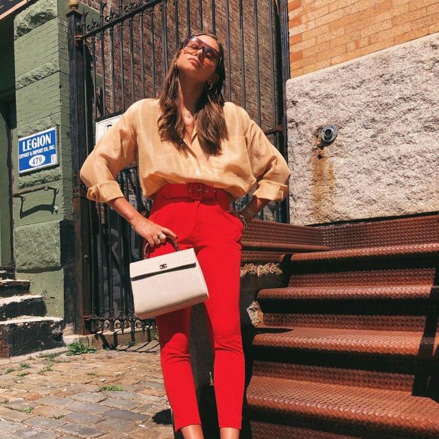 The red pants to the waistband of Danielle Bernstein's account on the Instagram of @weworewhat