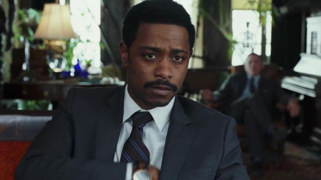 BROWN TIE WITH BLUE STRIPES worn by Detective Troy Archer (LaKeith Stanfield) in Knives Out