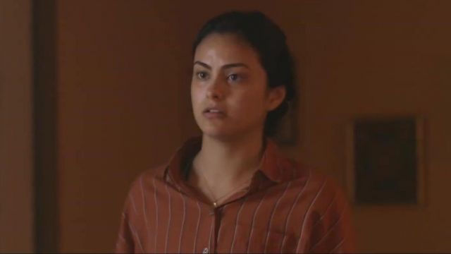 The orange shirt and striped Ester (Camila Mendes) in Coyote Lake