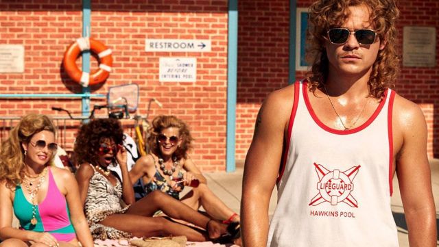 The white Tank top and red Hawkins Pool Billy Hargrove (Dacre Montgomery) in Stranger Things Season 3