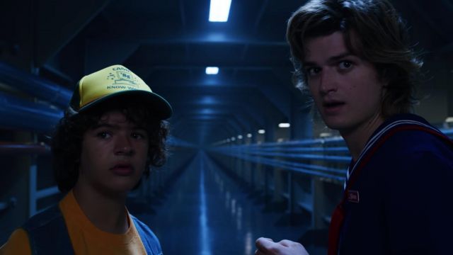 The cap of the yellow and green worn by Dustin Henderson (Gaten Matarazzo) in Stranger Things Season 3 Episode 5
