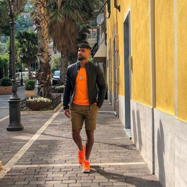 The orange t-shirt worn by Jonathan Matijas on his account Instagram @matijasjonathan