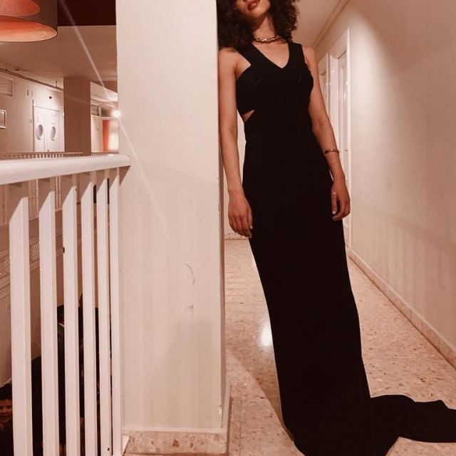 Black Maxi Dress with Cutouts worn by Mina El Hammani on her Instagram account @minaelhammani