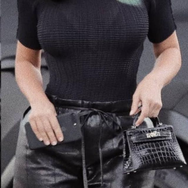 Hermes Vintage 20cm Black Shiny Porosus Crocodile Mini Kelly worn by Kim Kardashian West Commons Mall in Calabasas July 26, 2019