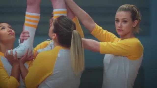 Urban Outfitters White and Yellow 70s Baseball T-shirt worn by Betty Cooper (Lili Reinhart) in Riverdale (Season 01 Episode 10)