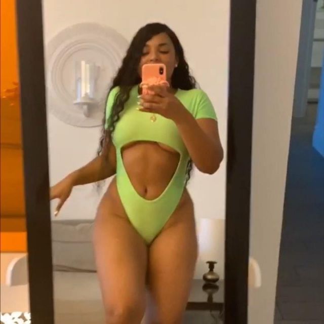 The Swimsuit lime green neon short sleeve and cut-outs of Ashanti on the account instagram of @ashanti
