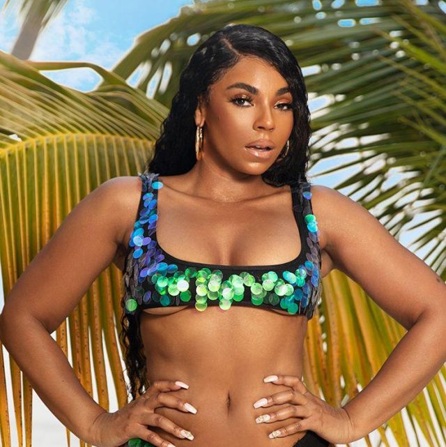 The bikini Top with black sequined collar and rounded of Ashanti on the account instagram of @ashanti