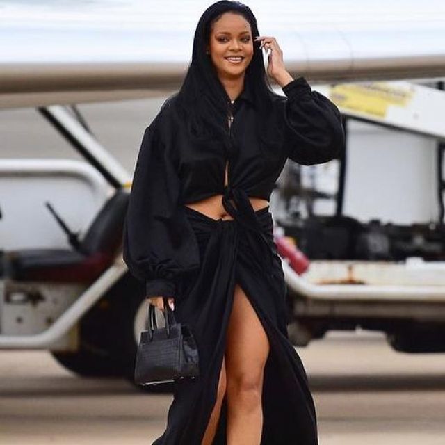 Fenty Xlong Draped Skirt worn by Rihanna Arriving in Barbados August 4 ...