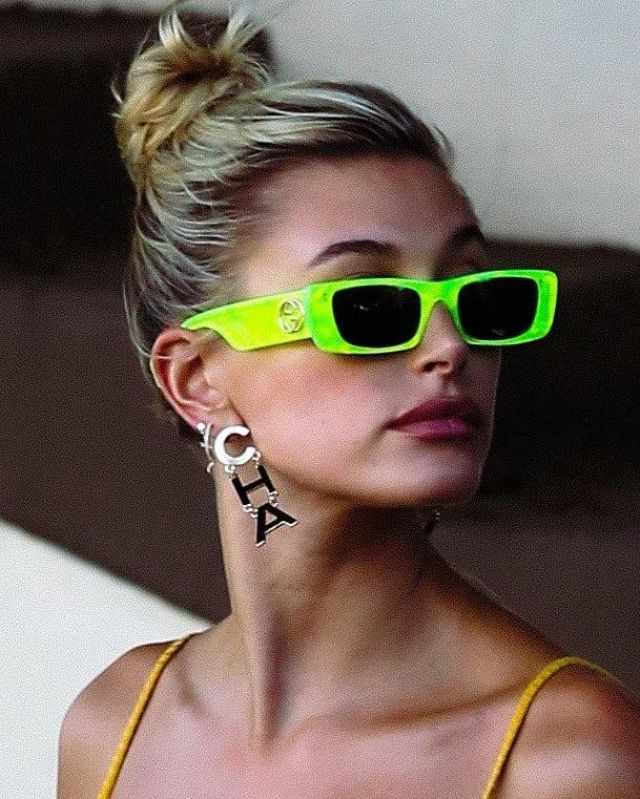 Gucci Fluo Narrow Acetate Rectangular Sunglasses worn by Hailey Baldwin With Justin Bieber August 28, 2019